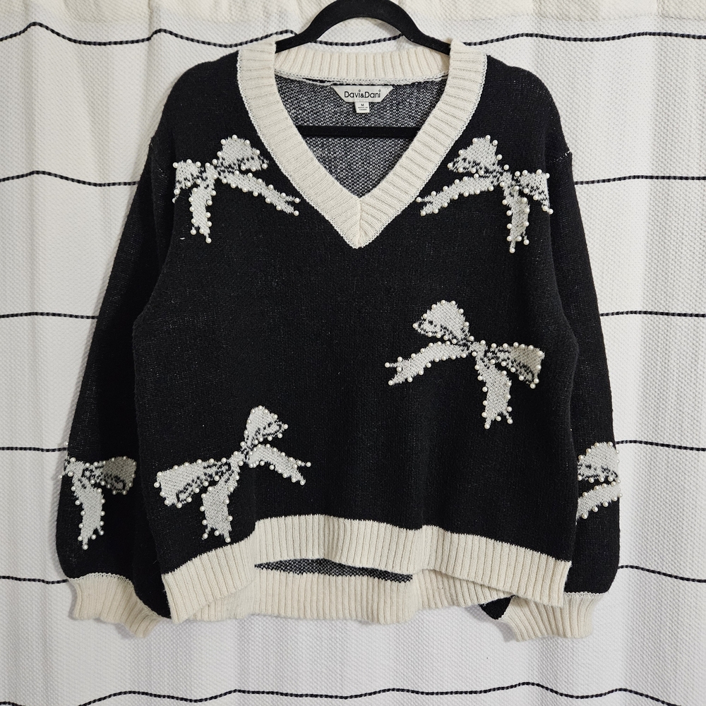 DAVI & DANI Black V-Neck Sweater with Cream Bow Accents